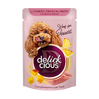 Додатковий консервований корм для дорослих собак DELICKCIOUS™ "Пластівці з індичкою та тропічними фруктами у вершковому соусі", 80 г